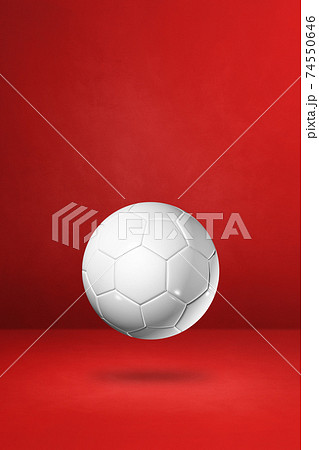 White soccer ball on a red studio backgroundのイラスト素材 [74550646] - PIXTA