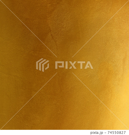 Gold or yellow paint on cement wall texture or background Gold or yellow paint on cement wall texture or background 74550827