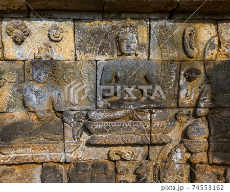 Bas-relief in Borobudur Buddist Temple - island Java Indonesia 74553162