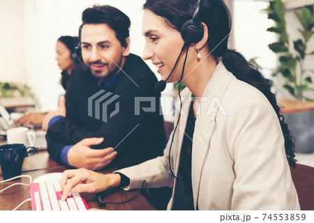 Call center and customer service team support for information operator at work. Call center and customer service team support for information operator at work. 74553859