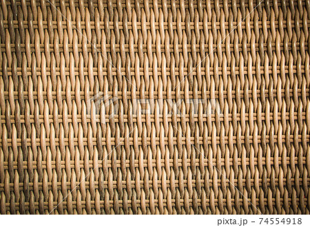 background brown wicker basket. Selective focus. Texture background brown wicker basket. Selective focus. Texture 74554918