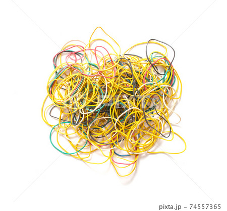 Many multi-colored rubber bands for money on a white background, isolate. Stationery concept Many multi-colored rubber bands for money on a white background, isolate. Stationery concept 74557365