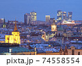 Prague - spires of the old town and office high-rises at dusk 74558554