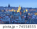 Prague - Spires of the Old town and illuminated National museum. 74558555
