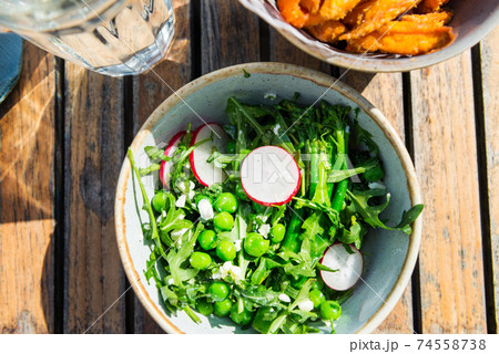 Lunch with Salad from grilled Broccoli and Baked Sweet Potato Fries Lunch with Salad from grilled Broccoli and Baked Sweet Potato Fries 74558738