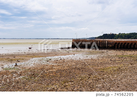 The harbour of Cancale at low tide The harbour of Cancale at low tide 74562205