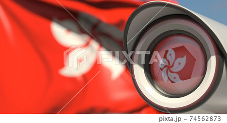 CCTV camera and flag of Hong Kong. National surveillance system conceptual 3D rendering CCTV camera and flag of Hong Kong. National surveillance system conceptual 3D rendering 74562873