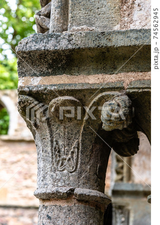 Romanesque capital in medieval abbey in Brittany 74562945