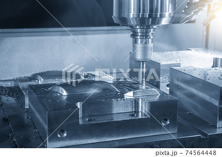 The CNC milling machine rough cutting  the injection mold parts . 74564448