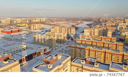 Tall new buildings in a Russian winter city. New residential areas of Penza with houses in winter. Sleeping area of the city of Penza. Penza city from above. Tall new buildings in a Russian winter city. New residential areas of Penza with houses in winter. Sleeping area of the city of Penza. Penza city from above. 74567767
