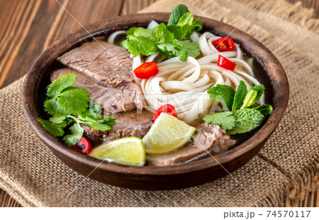 Bowl of Vietnamese pho bo 74570117