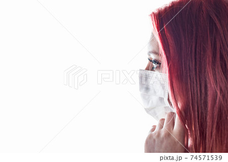 Side view closeup portrait of woman with medical mask. 74571539