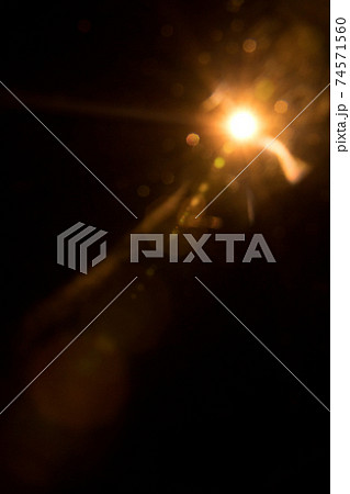 Abstract Natural Sun flare on the black Abstract Natural Sun flare on the black 74571560