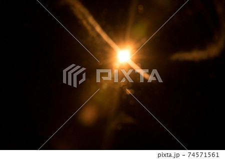 Abstract Natural Sun flare on the black 74571561