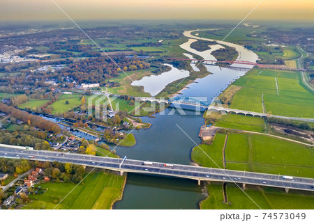 Lowland river IJssel with bridges Lowland river IJssel with bridges 74573049