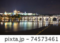 Pargue charles bridge and prague castle by night reflections river 74573461