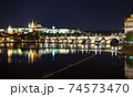 Pargue charles bridge and prague castle by night reflections river 74573470