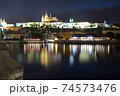 Pargue charles bridge and prague castle by night reflections river 74573476