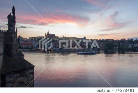 Prague charles bridge sunset view with castle in backgorund Prague charles bridge sunset view with castle in backgorund 74573481