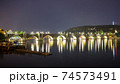 Pargue charles bridge and prague castle by night reflections river 74573491