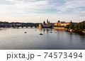 Charles bridge prague sunset light beautiful river water 74573494