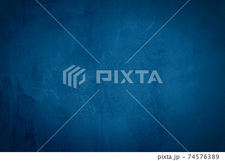 Vintage grunge blue concrete texture studio wall background with vignette. 74576389