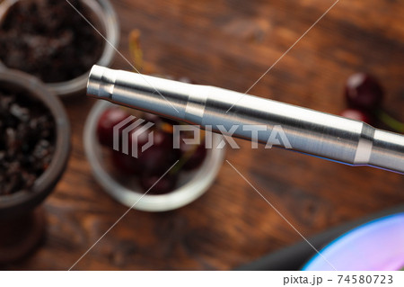 Shisha parts with fresh cherry close up Shisha parts with fresh cherry close up 74580723
