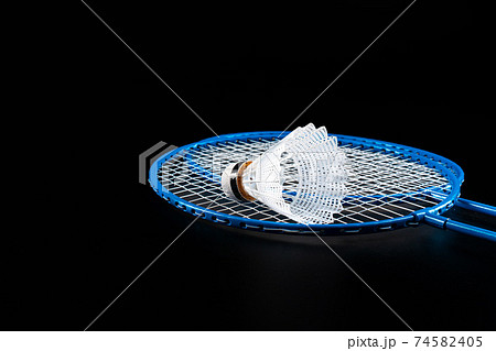 Badminton sport equipment on dark black background 74582405