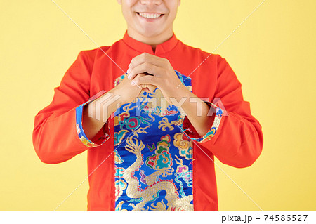 Man making greeting gesture Man making greeting gesture 74586527