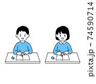 机を並べて勉強する男の子と女の子 74590714