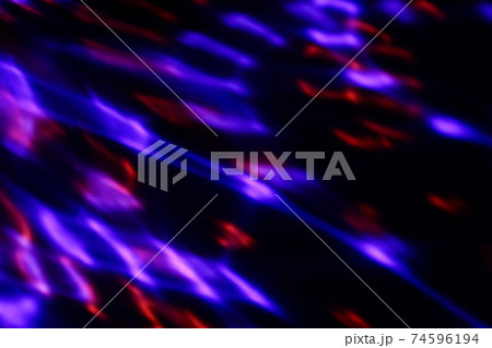 colorful neon light leaks on black background 74596194