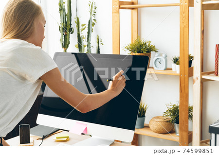 Young woman and tablet working at home office. Stay safe and working from home. 74599851