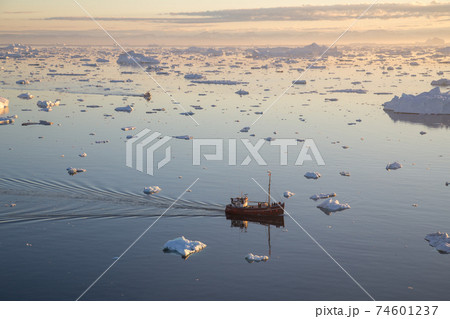 Red Fishing Boat in Ilulissat Icefjrod Red Fishing Boat in Ilulissat Icefjrod 74601237