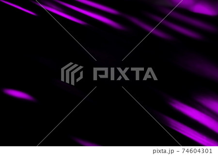 colorful neon light leaks on black background 74604301