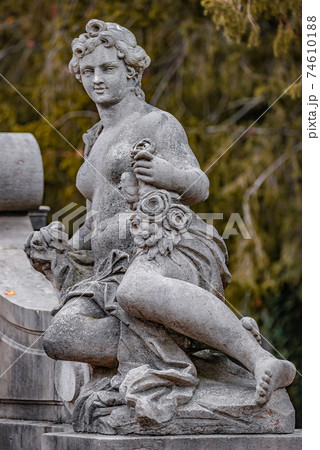 Statue of sensual Roman renaissance era woman after bathing, Potsdam, Germany, details, closeup Statue of sensual Roman renaissance era woman after bathing, Potsdam, Germany, details, closeup 74610188