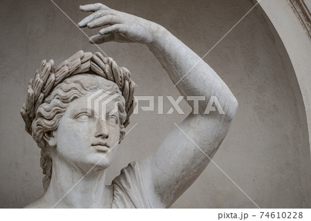 Statue of sensual Roman renaissance era woman in circlet of bay leaves, Potsdam, Germany, details, closeup Statue of sensual Roman renaissance era woman in circlet of bay leaves, Potsdam, Germany, details, closeup 74610228
