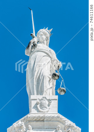 Statue as roof decoration of Doge's Palace in Venice, Italy Statue as roof decoration of Doge's Palace in Venice, Italy 74611166