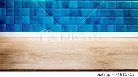 wooden desk space and tiles home background with copy space 74611715