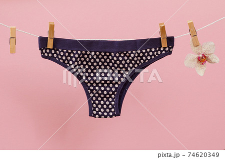 Beautiful women's cotton panties on pink background. Beautiful women's cotton panties on pink background. 74620349