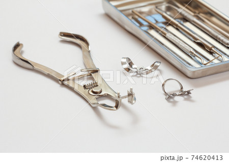 Metal dental instruments for teeth dental care 74620413