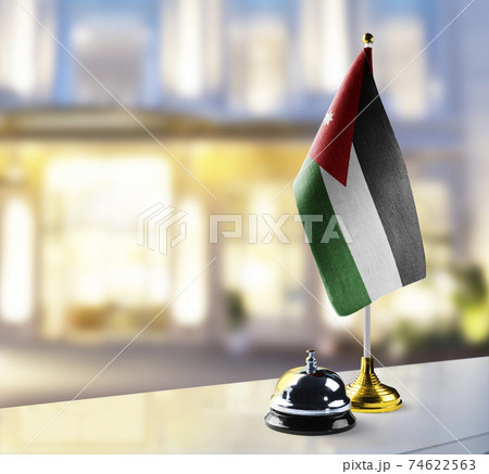 Jordan flag on the reception desk in the lobby of the hotel 74622563