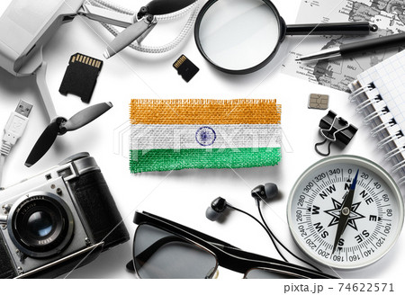 Flag of India and travel accessories on a white background. 74622571