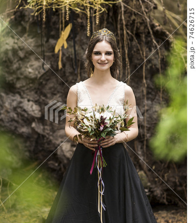 bride with bouquet on background of nature bride with bouquet on background of nature 74626715