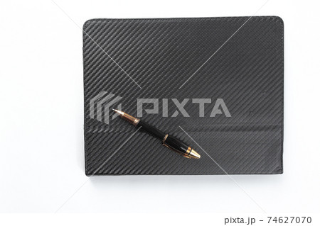 organizer and stylish pen on white background.photo with copy space organizer and stylish pen on white background.photo with copy space 74627070