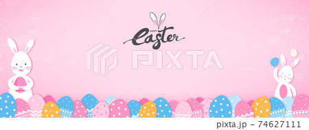Cute bunnies and colorful Easter eggs on pink banner background 74627111
