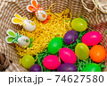 Basket Colorful Easter eggs bunny ears. Funny Easter concept.Close-up. 74627580