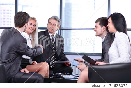 handshake of business partners at the working meeting 74628072