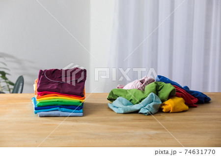Tidy and organized clothes with the konmari method 74631770