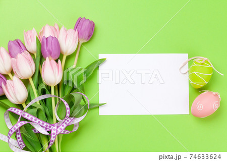 Easter greeting card with easter eggs and tulips 74633624