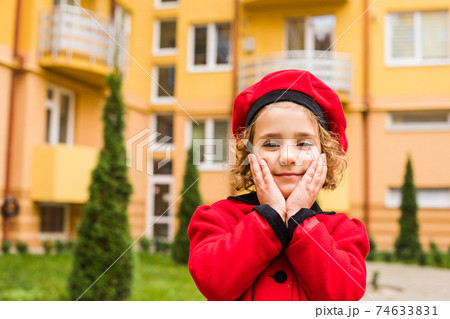 Girl portrait with outdoor playground at the background Girl portrait with outdoor playground at the background 74633831